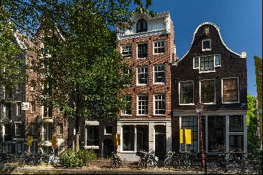 Two connected canal houses with private parking garage in Amsterdam city centre