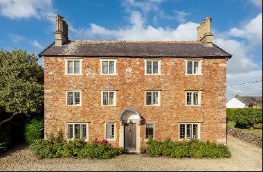 A stunning Grade II listed 17th Century former Vicarage situated in the centre of a popula