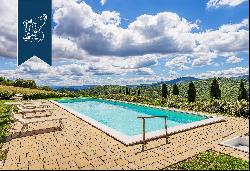 Luxury farmhouses converted into an accommodation facility in a stunning panoramic positio