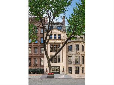 Grand and lavish, this limestone townhouse, on a highly coveted block known for its magnif