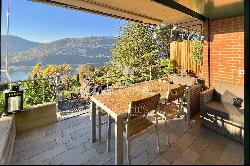 Cozy apartment for sale in Montagnola with lake view & private garden