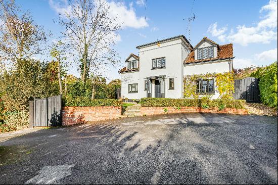 A lovely family home in the sought after village of Prestbury.