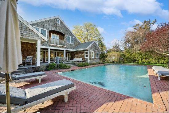 Located in the Quogue Estate Section, South of Quogue St., this spectacular 4500 sq ft hom