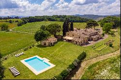 A romantic estate perched atop the undulating hills in Tuscany