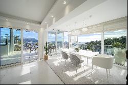 Exceptional 2-beds penthouse with private pool and panoramic sea and city views.