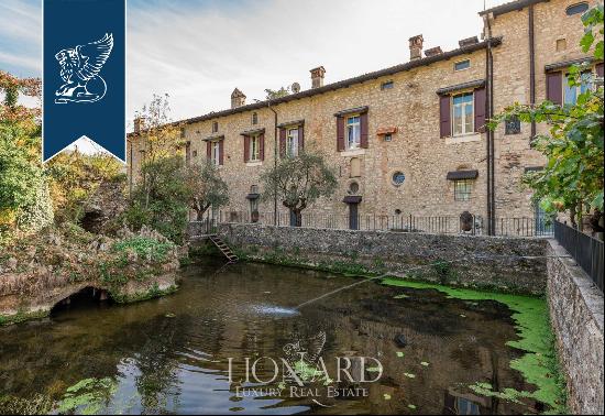 Stunning 19th-century estate for sale in a charming town centre of the province of Brescia