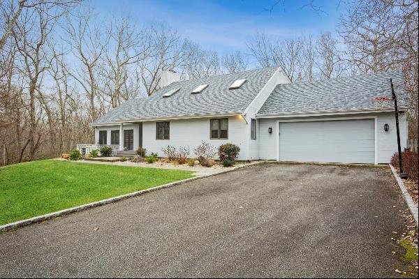 Escape to the peace and quiet of this welcoming home on a quiet, secluded Sag Harbor cul-d