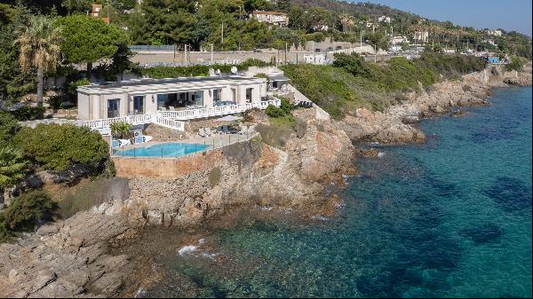 Unique waterfront property with a swimming pool and direct access to the beach in Cannes