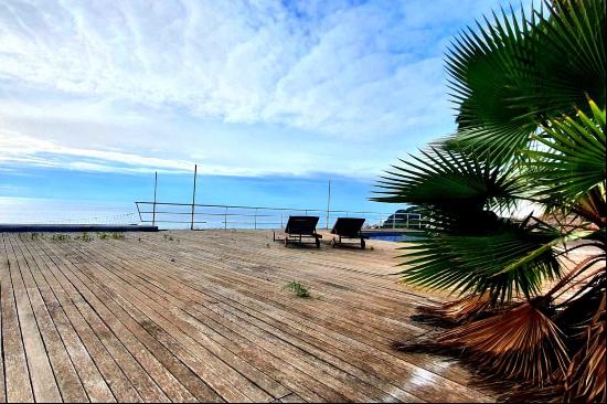 Watching the sea from the living room and sleeping to the sound of the waves.