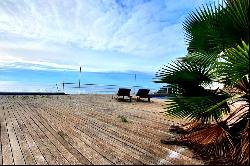 Watching the sea from the living room and sleeping to the sound of the waves.