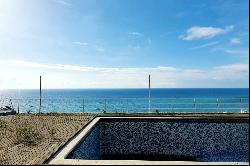 Watching the sea from the living room and sleeping to the sound of the waves.