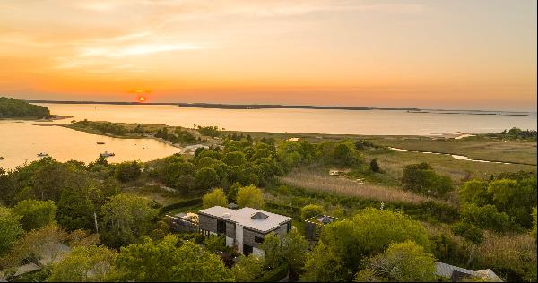 Privacy, views and a work of art are best words to describe this East Hampton gem. This be