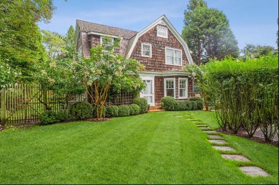 Centrally located in the heart of East Hampton Village, this four bedroom, 3 and a half ba