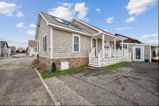 Sitting pretty in this gated oceanfront complex is this two bedroom, one and one half bath