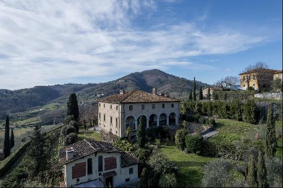 Majestic period villa with views over the Tuscan countryside.