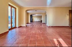Ruvigliana: for sale spacious apartment with wonderful lake view & swimming pool
