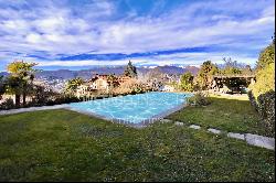 Ruvigliana: for sale spacious apartment with wonderful lake view & swimming pool