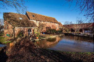 A wonderful converted watermill with outstanding income generating opportunities. Five acc