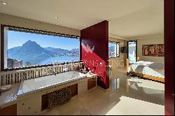 Modern villa for sale in Ruvigliana with large panoramic terrace overlooking Lake Lugano