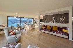 Modern villa for sale in Ruvigliana with large panoramic terrace overlooking Lake Lugano