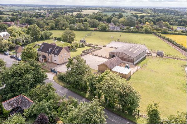 A light and spacious modern farmhouse with equestrian facilities, wonderful views and 4 ac