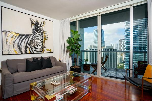 Spectacular waterfront W-Hotel condo 1BR/1BA located at the Icon Brickell. Steps away from