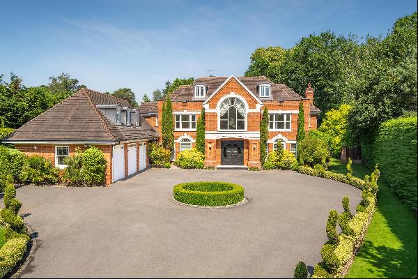 An exceptional six bedroom gated residence built by Applegate Homes.