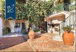 Luxurious villa with annexes surrounded by majestic centuries-old olive trees