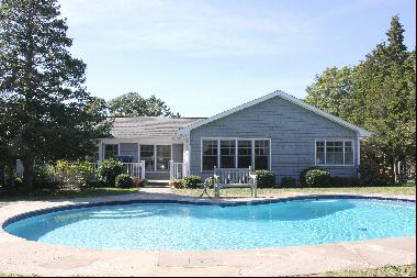 Pristine and bright, three-bedroom, two-bath Ranch with spacious yard and heated pool. Con