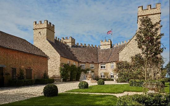 A unique Grade II listed castellated house dating from 1741, set in a sought-after and rur