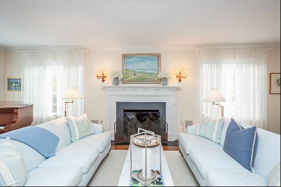 Renovated and charming, Cottage-style, three-bedroom home with first level principal suite