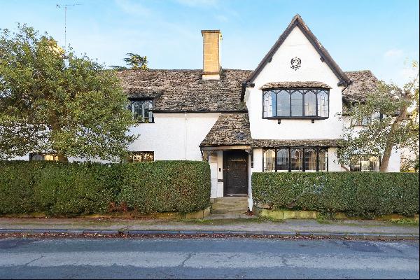 A charming Grade II listed family home in lovely gardens of approximately 0.3 acres.