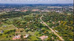 Vast residential lot in Camino del Golf, Surubi'i.