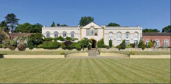 A stunning home with private garden overlooking the croquet lawn and hills beyond.