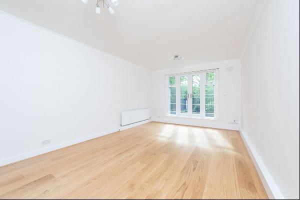 A 2 bedroom flat for sale on Parkhill Road, NW3.