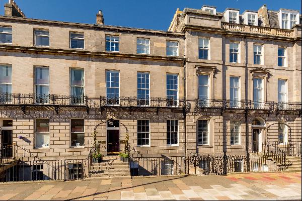 An exceptional West End Georgian townhouse including two mews properties, castle views, a 