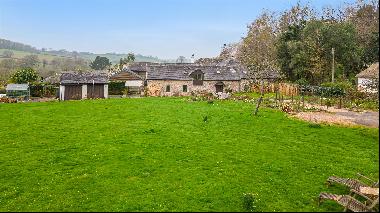 A gorgeous stone built barn with garden studio / annexe, set within 1 acre of gardens and 