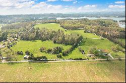 Over 36 acres of partially cleared and mostly level land with East TN Views!