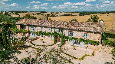 An exquisitely renovated manor house in an enchanting French countryside setting with a sw