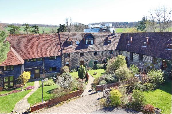 A characterful, Grade II listed property, set in a wonderful rural position between the vi