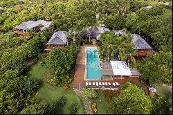 Beach front house surrounded by nature