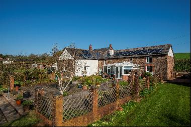 A wonderful family home set in a rural hamlet with views over exquisite, unspoilt countrys