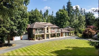 An impressive residence with superb leisure facilities, standing in over an acre of ground