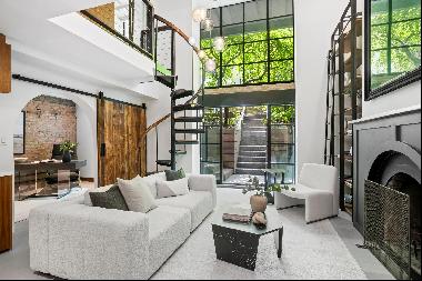 In the heart of Chelsea, set inside one of the famed 19th-century Fitzroy Townhouses, this