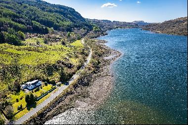 An attractive property on the West Coast close to Oban with great views overlooking Loch F