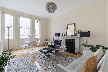 A two bedroom apartment with a terrace for sale in Bina Gardens, London SW5.