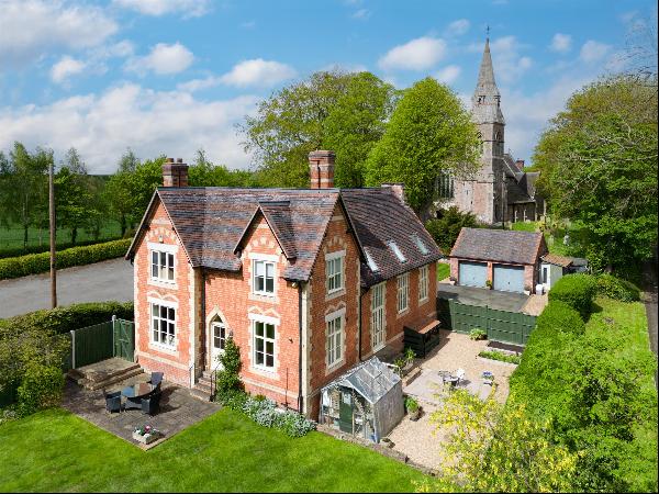 A handsome period property with lovely private gardens in the pretty village of Yockleton,