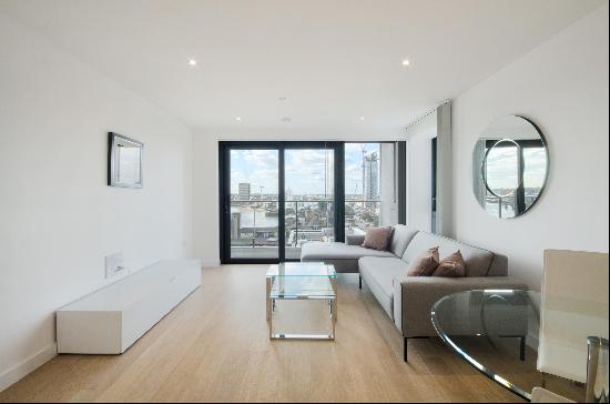 A modern south-facing apartment with river views, in a luxury development.