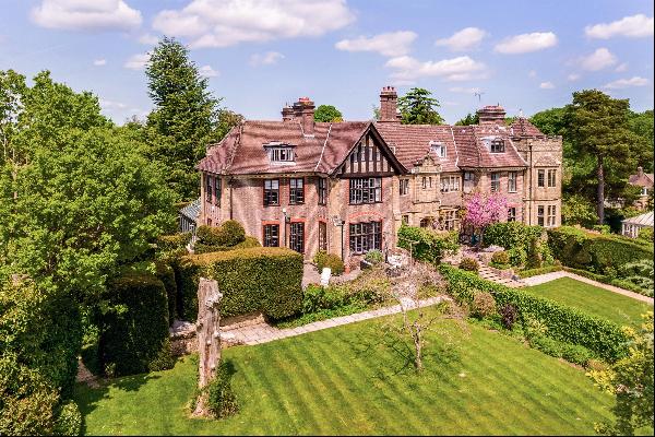 A substantial portion of a magnificent Grade II Listed former royal mansion within beautif