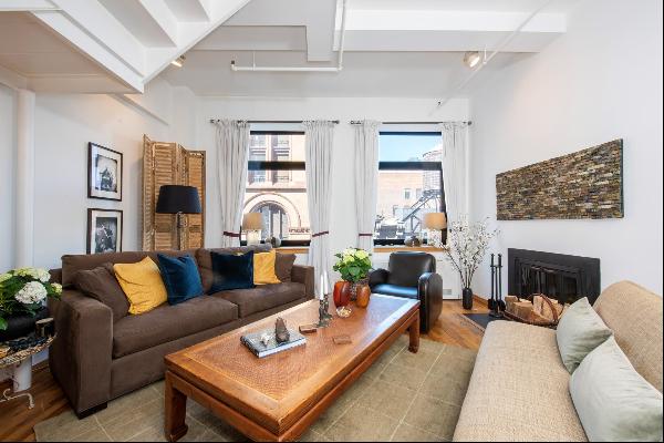 THE ONLY TRUE "LIVE/WORK" APARTMENT AT THE SILK BUILDING IS NOW AVAILABLE!Don't miss out o